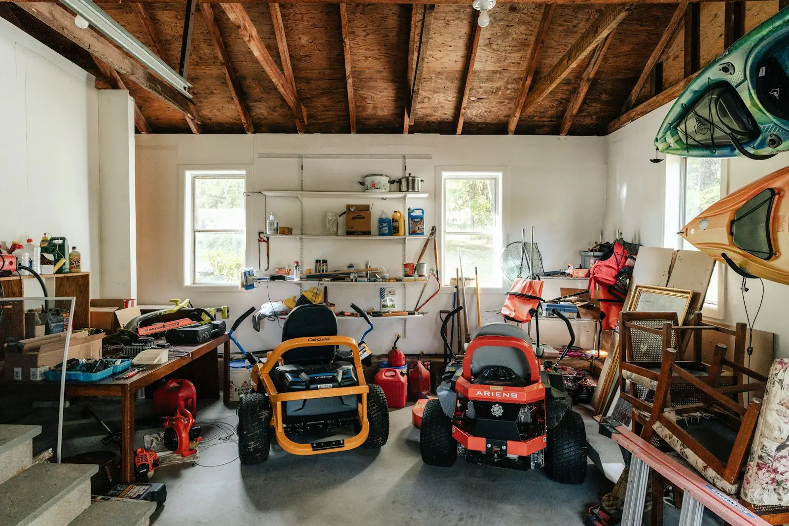 Cluttered garage with household items awaiting a professional cleanout